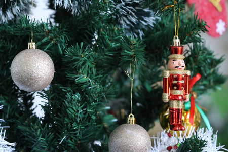 Christmas tree with toys on blurred background. Christmas and New Year concept.の写真素材