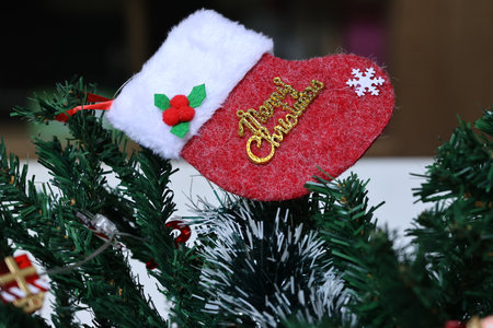 Christmas ornaments on the Christmas tree, closeup of photoの写真素材
