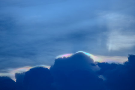 The cloud has rainbow colors.の写真素材