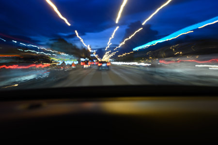 A photo of the road while driving, viewed from inside the car.の写真素材
