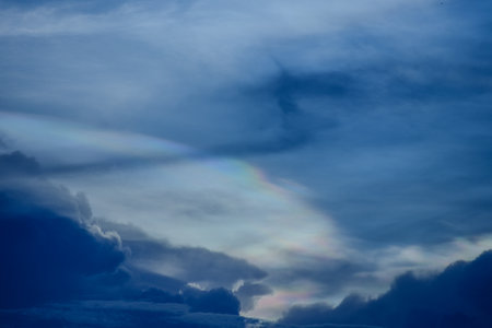 The cloud has rainbow colors.の写真素材