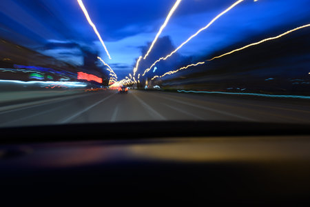 A photo of the road while driving, viewed from inside the car.の写真素材