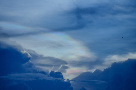 The cloud has rainbow colors.の写真素材