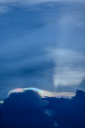 The cloud has rainbow colors.の写真素材