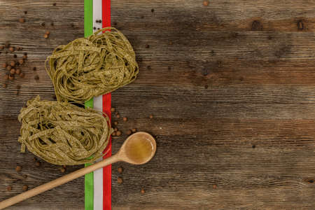 Italian pasta on the kitchen tableの写真素材