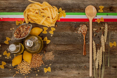Italian pasta on the kitchen tableの写真素材