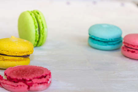 Fresh macaroons on the white wooden backgroundの写真素材