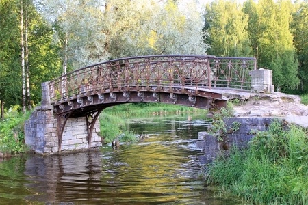 The ruined bridge in the Gatchina park. Suburb of St. Petersburg, Russiaの写真素材