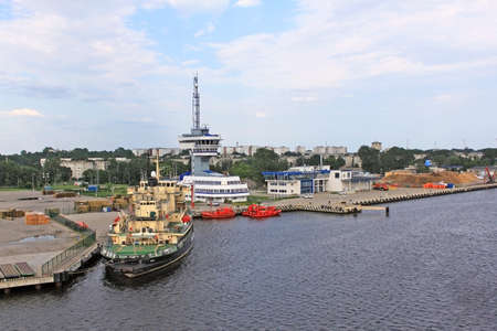 RIGA, LATVIA - CIRCA JULY 2011: Icebreaker VARMA and pilot boats in the Freeport of Riga.のeditorial素材