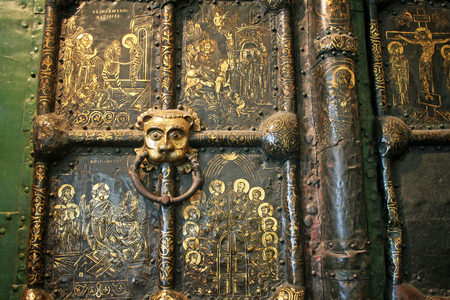 Suzdal. Russia - 16 July 2017: Cathedral of the Nativity. Golden gate, made in the technique of fire gilding. The main ornamental compositions of the gate is the description of the life of Jesus Christ and the virgin.のeditorial素材