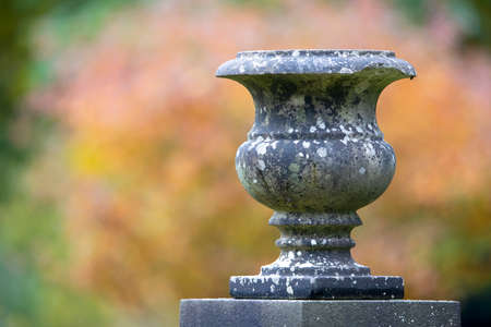 statue of a beautiful marble stone in the garden in the park. the concept is a small cemetery