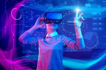 Woman with glasses of virtual reality. Future technology concept. Colorful neon lights.