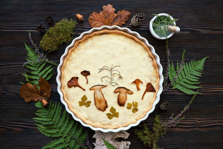 Homemade pie with forest mushrooms and curd cheese on a light background. Autumn concept, top view