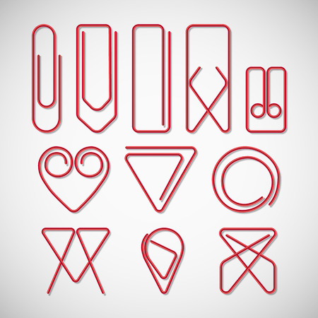 Red paper clips isolated on white backgroundのイラスト素材