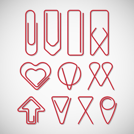 Red paper clips isolated on white backgroundのイラスト素材