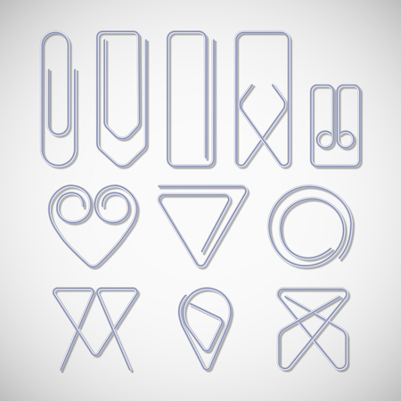 Silver paper clips isolated on white backgroundのイラスト素材