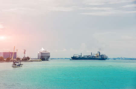 Logistics and Transportation of international Container Cargo ship in the ocean at twilight sky, freight Transportation shippingの写真素材