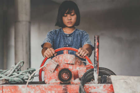 Children working at construction site for world day against child labour concept:の写真素材