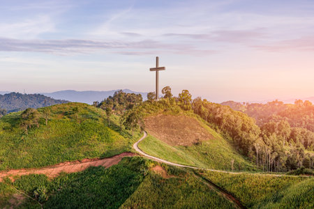 Easter concept. Beautiful landscape with road leads up to cross. Religion concept.Christianity backgroundの写真素材