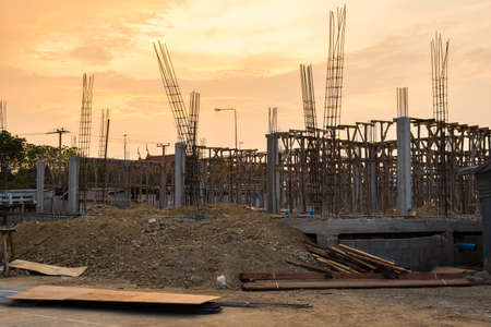Construction of house in twilight sky.