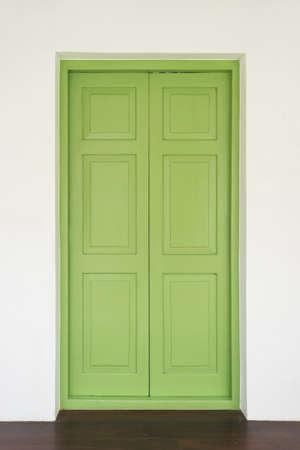 green wood door.の写真素材