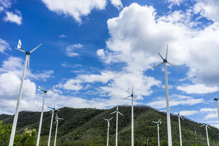 wind turbine with blue sky.