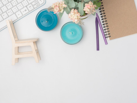 Flat lay, top view office table desk frame. feminine desk workspace with laptop, watch on white background.Love concept top view composition.note for something in love emotion.の写真素材