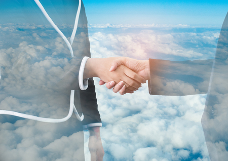 Double exposure of success business woman city background.time for business.の写真素材