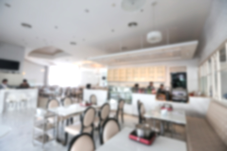 Abstract background luxury restaurant interior, blurred restaurant cafe, white interior vintage contemporary modern style.の写真素材
