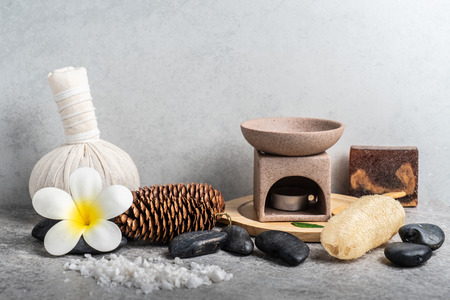 Aromatherapy  product  Spa set massage with concrete  background. top view,flat lay composition.