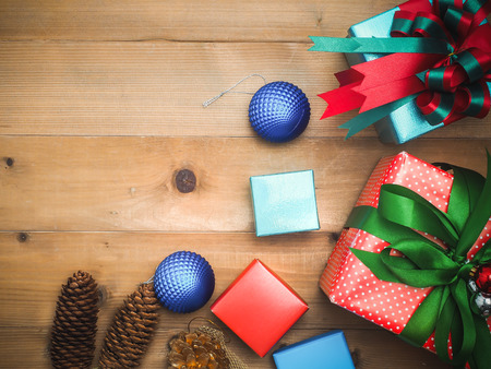 christmas decoration with wood  background.gift box top view on wood table.snow graphic pattern.の写真素材