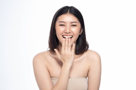 Beautiful Young Asian Woman short hair  with Clean Fresh Skin. Face care, Facial treatment, Cosmetology, beauty and healthy skin and cosmetic ideas concept.の写真素材