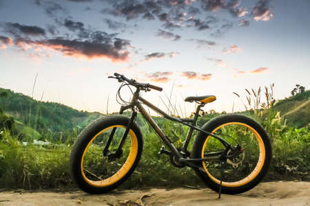 Black Bicycle At Majestic Light Background.のeditorial素材