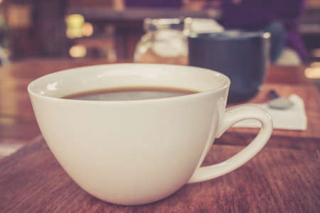 Close-Up Cup Of Espresso On Wooden Background.の写真素材