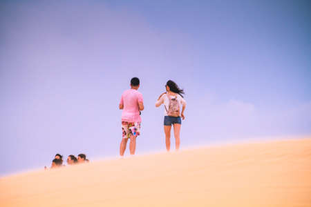 Mui Ne, Vietnam - May 26, 2017: Unidentified People In Sunny Day With Blue Sky On Sand Dune (White Desert) In Mui Ne Vietnam.のeditorial素材