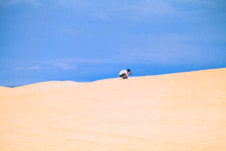 Mui Ne, Vietnam - May 26, 2017: Unidentified People In Sunny Day With Blue Sky On Sand Dune (White Desert) In Mui Ne Vietnam.のeditorial素材