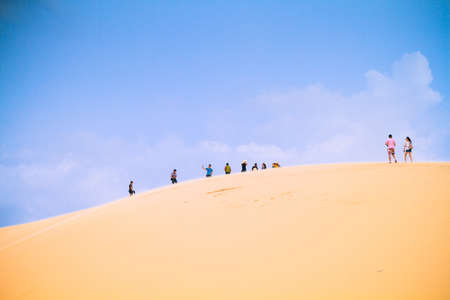 Mui Ne, Vietnam - May 26, 2017: Unidentified People In Sunny Day With Blue Sky On Sand Dune (White Desert) In Mui Ne Vietnam.のeditorial素材