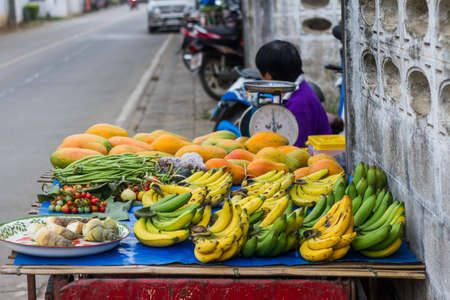 Chiang Rai, Thailand - April 01, 2017: Veggies And Fruits On The Local Market At Chiang Khong In Chiang Rai, Thailand.のeditorial素材