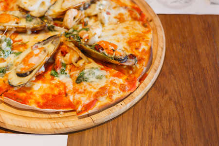 Meat Pizza Fast Food On Wooden Plate Background.の写真素材
