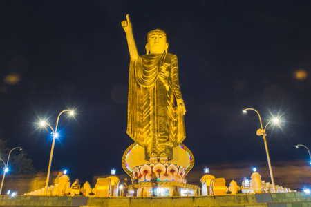 Kyainge Tong, Burma - March 10: Image Of Buddha Statue At Dark Night Background Is A Popular Tourists Attraction On March 10, 2017 In Kyainge Tong Burma.のeditorial素材