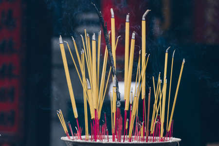 Incense Sticks On The Joss Stick Pot Are Burning And Smoke Use For Pray In Buddhism Life.の写真素材