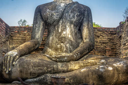 Sukhothai Province, Thailand - April 20, 2018: Ancient Image Of Buddha Statue Is Popular Tourists Attraction Inside Wat Srichum At Sukhothai Province, Thailand.のeditorial素材