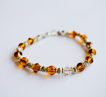 Brown bracelet on white backgroundの写真素材