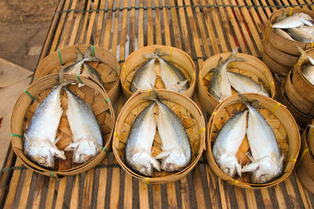 mackerel fish in bamboo basket at market thailand
