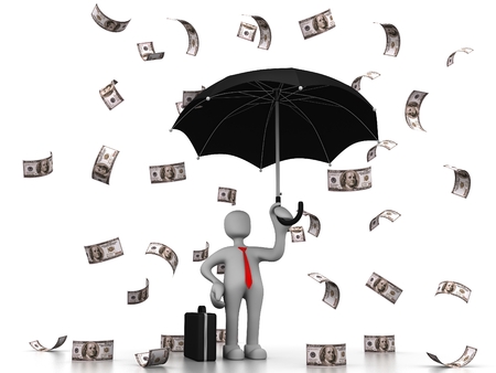 Business man enjoying it raining moneyの写真素材