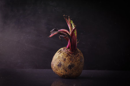 Beetroot on a black background. Copy space. Vegetarian concept.