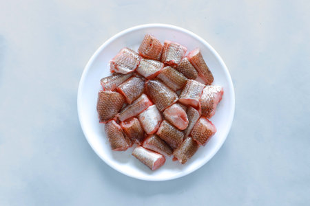 fresh KadaVaral fish with pieces on plate.