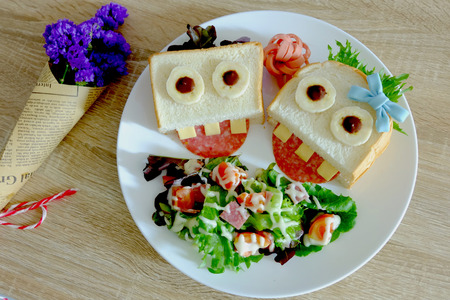 Cute sandwich on white plateの写真素材