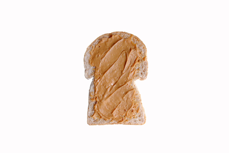 Bread slice and peanut butterの写真素材