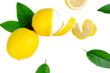 Lemon peel spiral and leave on white backgroundの写真素材